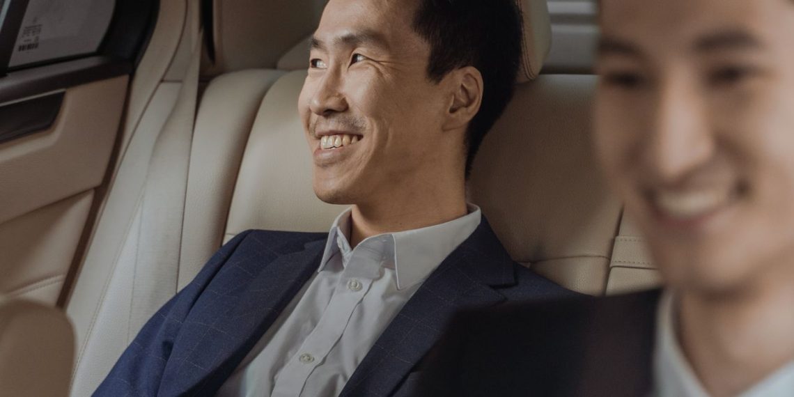 Professional chauffeur driving passengers comfortably through Cape Town